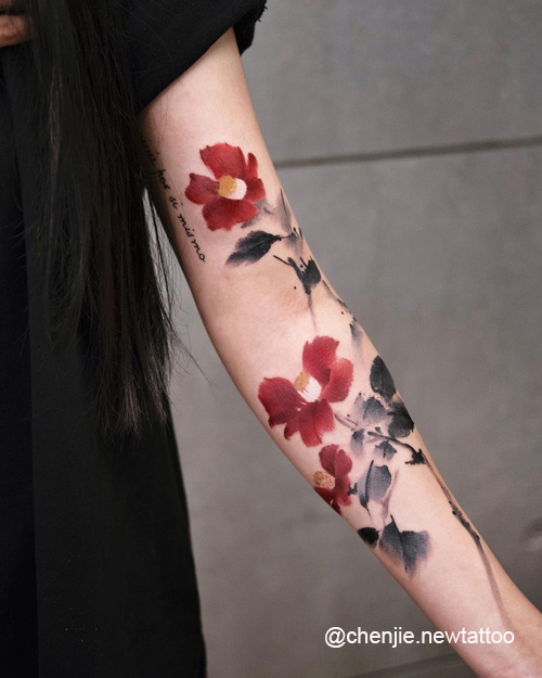 Camellia flower tattoo  black  grey red By Elisa Devihate  Flower  tattoo Tattoos Flower tattoo designs