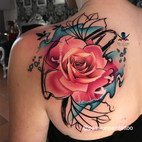 rose flower tattoo on back