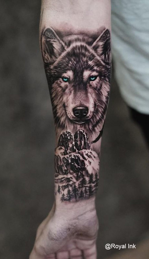 werewolf tattoo on forearm by Royal Ink