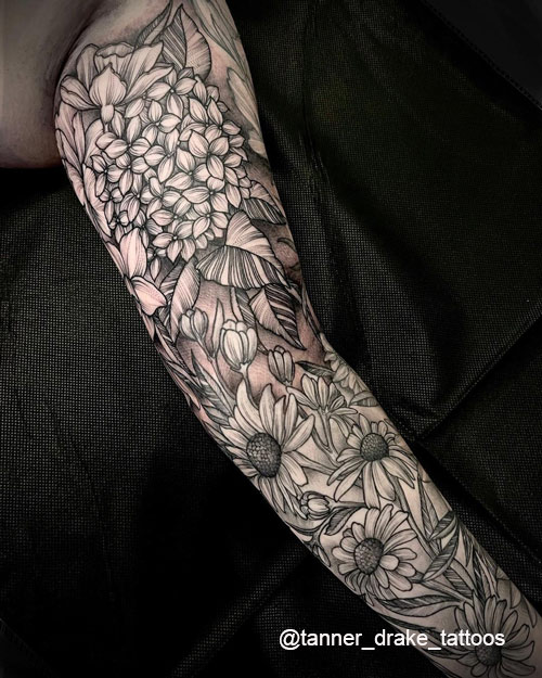 daisy flower tattoo on arm